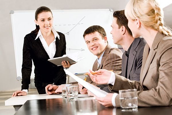 Portrait of business people discussing a new strategy